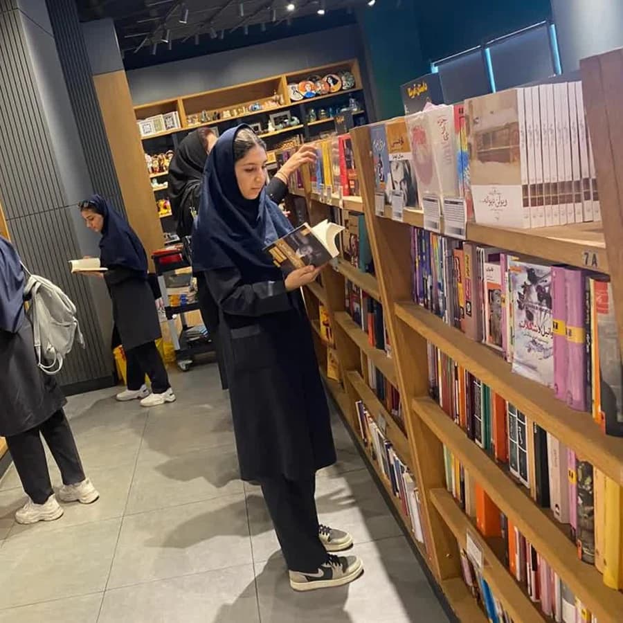 Students choosing books at a bookstore